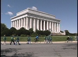 stock-footage-people-walk-and-bicycle-near-the-lincoln-memorial-in-washington-dc